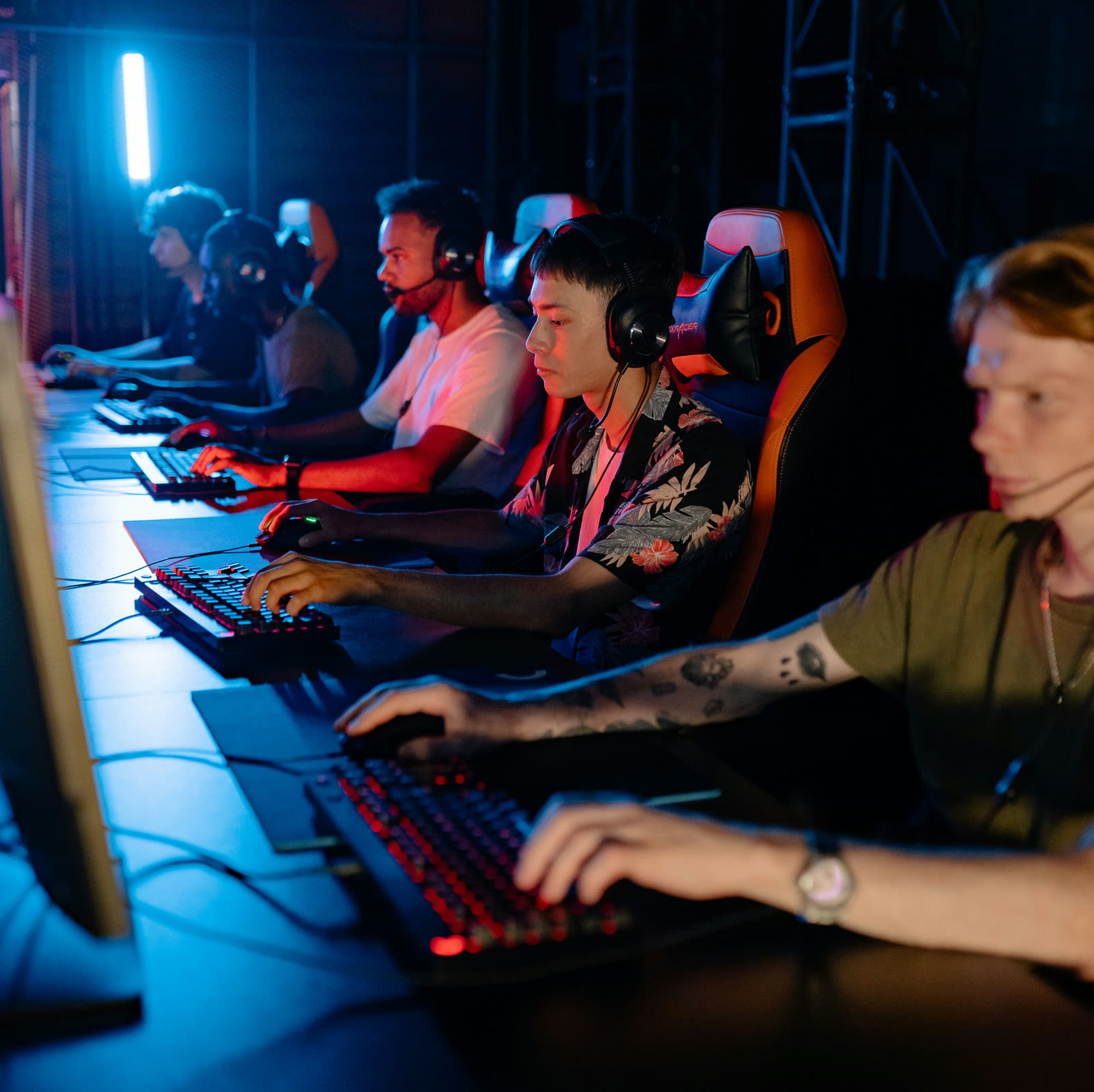 A row of NOPING team players seated together at their stations